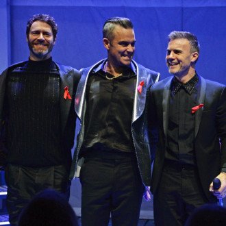 Robbie Williams ‘could rejoin Take That’