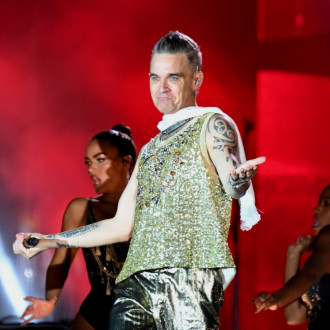 Robbie Williams recruits Black Sabbath's Tony Iommi for rock tune