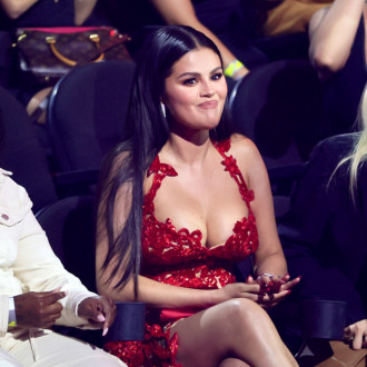 Selena’s Chris diss! Gomez praised for sneering over Chris Brown’s VMA nomination