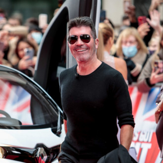 Simon Cowell's son 'transformed his life'