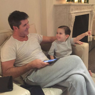 Simon Cowell's son loves new life in the country