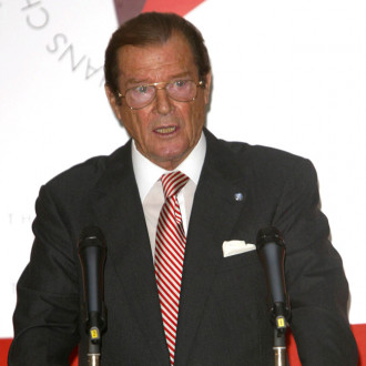 Sir Roger Moore gravesite 'vandalised with family shield stolen from tombstone'