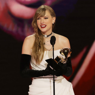 On top of the toilet and in a birdcage: Taylor Swift has awards EVERYWHERE