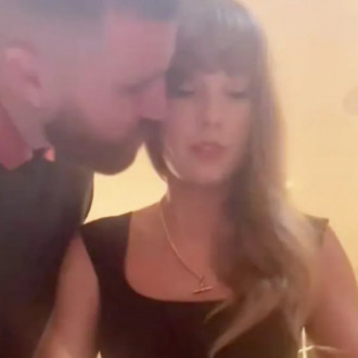 Taylor Swift releases intimate video featuring footage of Travis Kelce kissing her in kitchen!