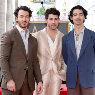 Jonas Brothers perform with their dad in Nashville