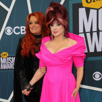 Wynonna and Ashley Judd tear up at late mom Naomi Judd's Country Music Hall of Fame induction