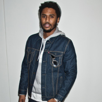 Trey Songz turns himself into cops after allegedly punching two people in bowling alley