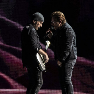 U2 team up with David Guetta for EDM version of Atomic City