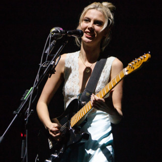 Wolf Alice land bank in London hours before Glasto set after US travel chaos